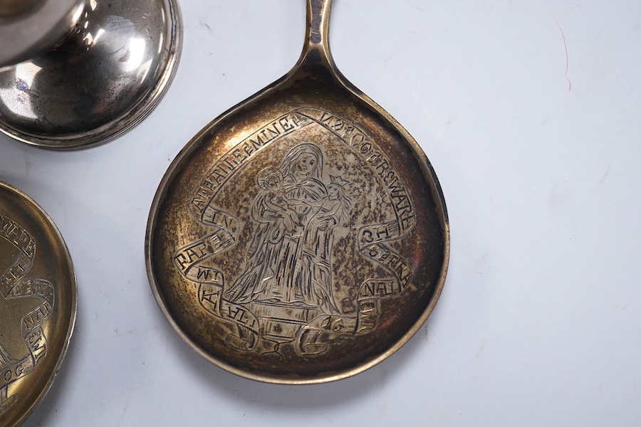 A George V silver sugar caster, by Harrod's Ltd, Sheffield, 1912, 18.4cm and a pair of Victorian commemorative spoons, Edward Pairpoint, London, 1878. Condition - fair to good.